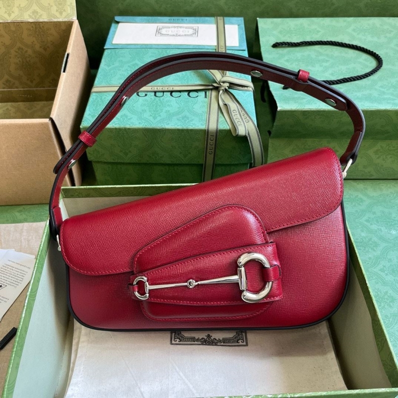 G*u*i top handle bags